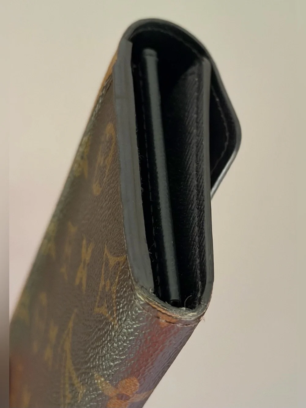 Louis Vuitton Sarah wallet in reverse monogram
